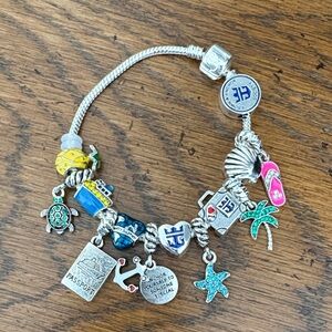Silver Travel Charm Bracelet with Blue, Turquoise & Pink Accents